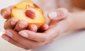 hands-holding-peach-300x180