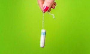 lady-holding-tampon-300x180