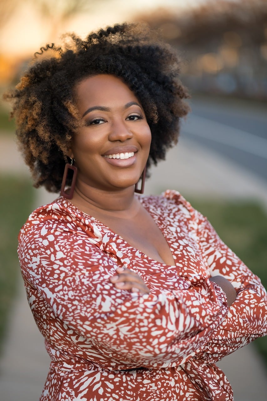 Showcasing a Smiling women on Walk In GYN annual visit blog post.
