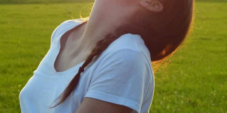 Image of a happy woman talking about HRT at Walk IN GYN Care