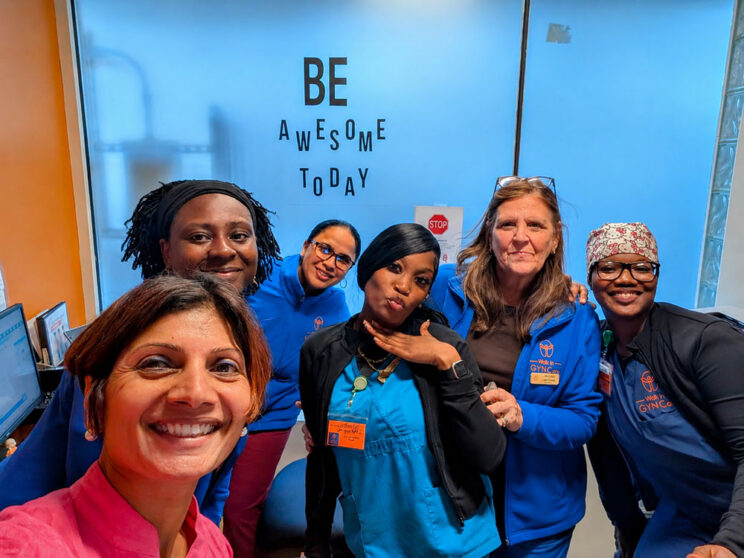 Walk In GYN Care Team Culture and Women’s Healthcare Staff posing together in New York women’s healthcare clinic.